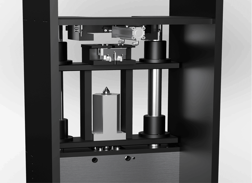 Custom automated assembly or testing fixture with pneumatic actuator, precision locating cone, and servo-driven upper tooling head mounted in a welded steel frame enclosure